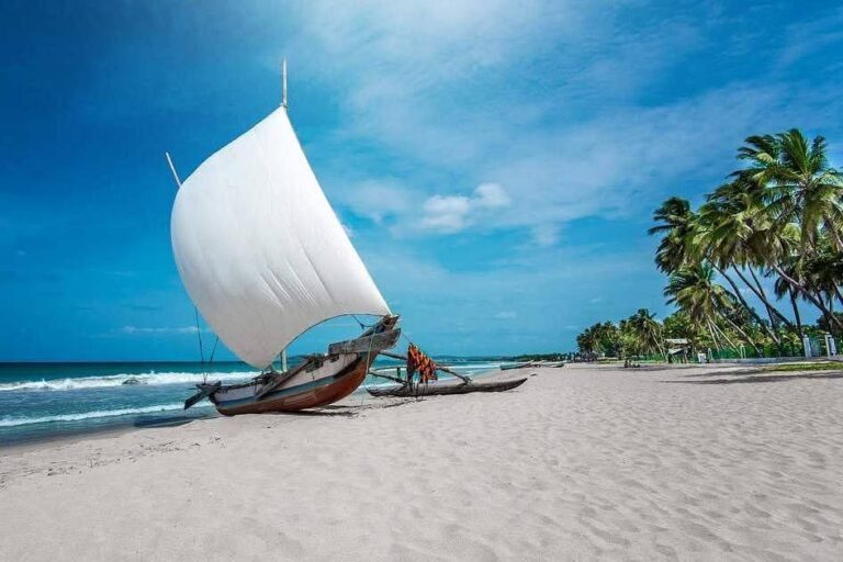 Traditional sailing boat on the beach at Trincomalee, Sri Lanka